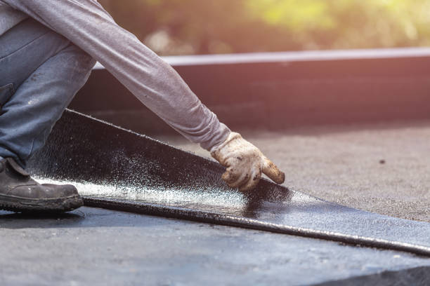 Professional Basement Waterproofing technician working in Galesburg, IL